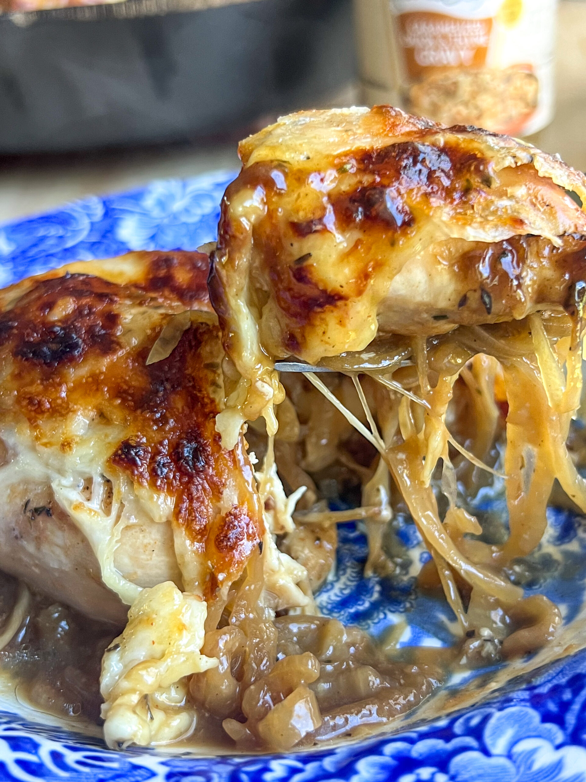 french onion chicken in blue bowl