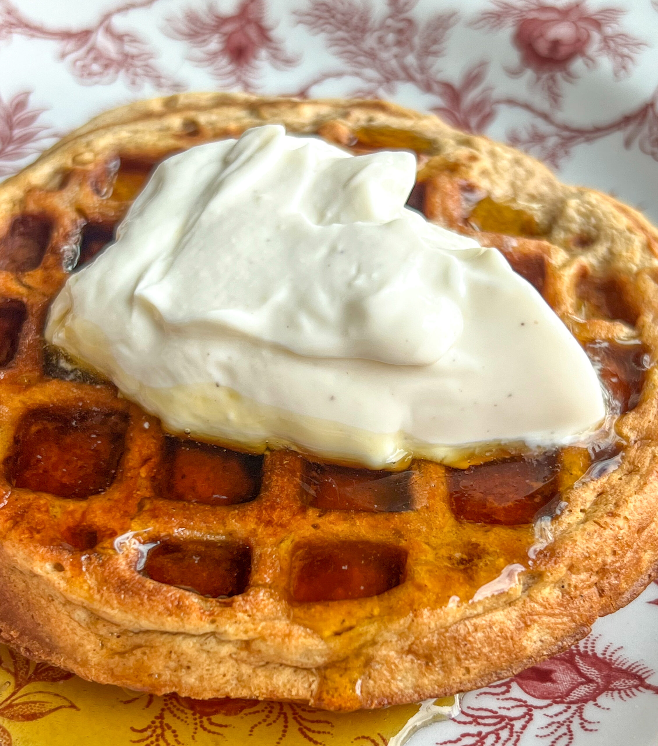 apple pie protein waffle topped with syrup