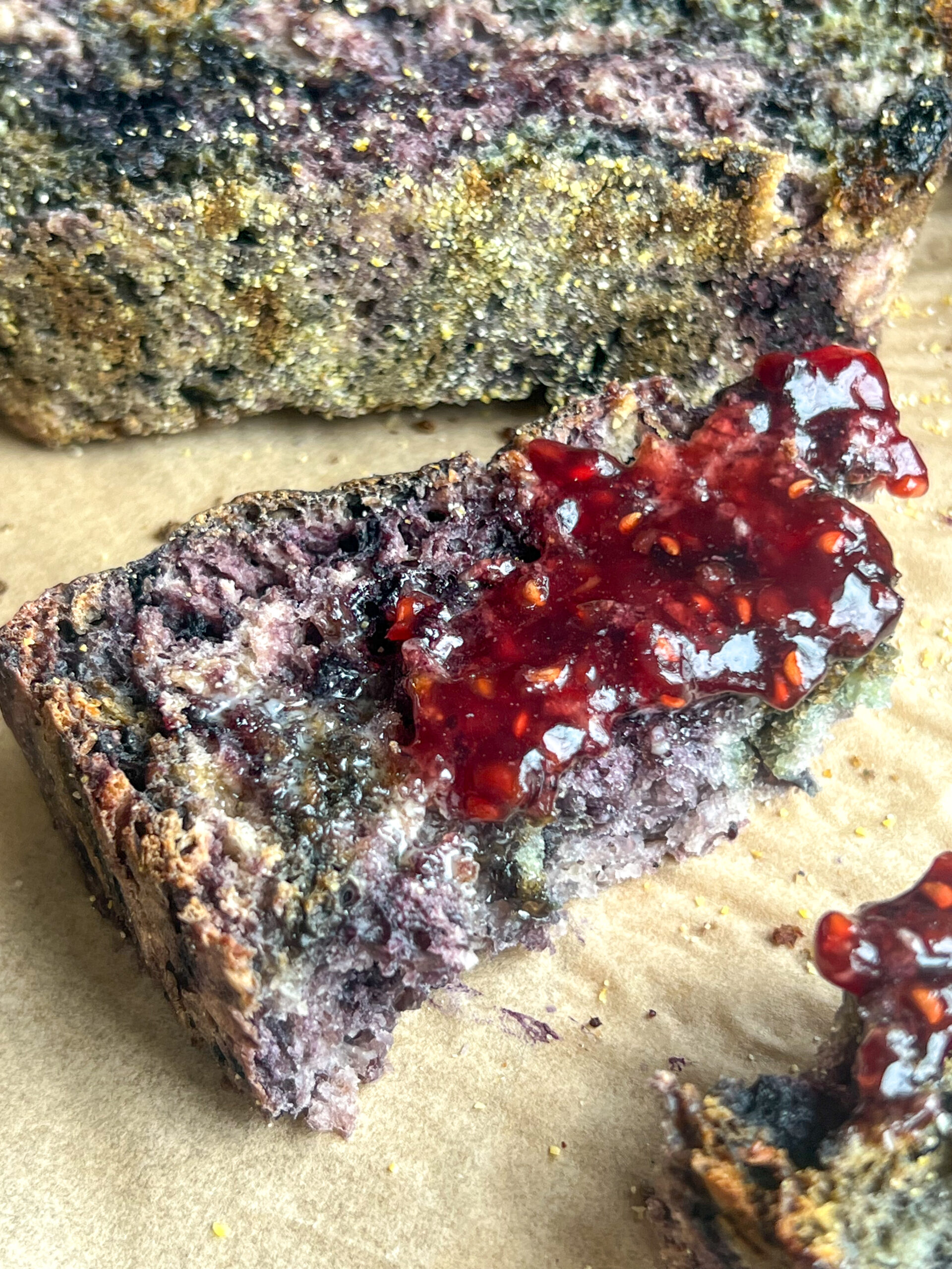 slice of blueberry english muffin bread topped with jam