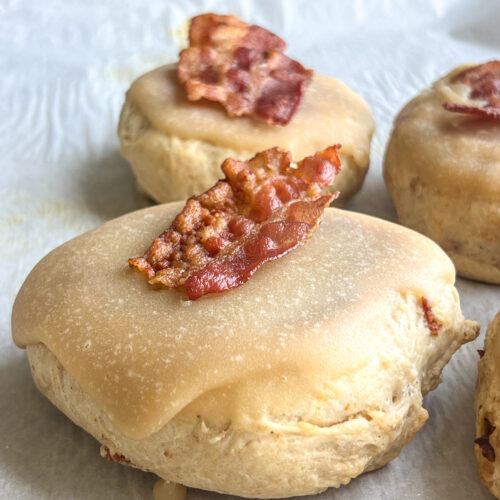 maple bacon donut english muffin with a slice of bacon on top