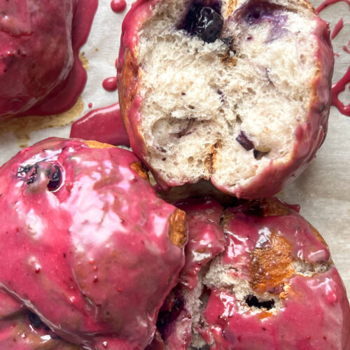 blueberry pretzel fritters with juicy blueberry chunks and a blueberry glaze