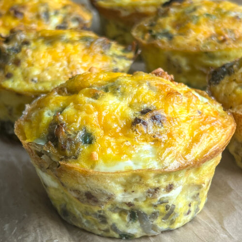 chorizo hash-brown egg bites on parchment paper