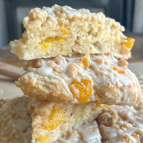 a stack of peach cobber scones