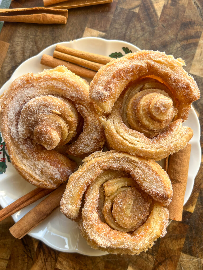 Shortcut Cinnamon Morning Buns on white plate and checkered cutting board