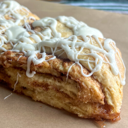 Eggnog Cinnamon Roll Scones with glaze