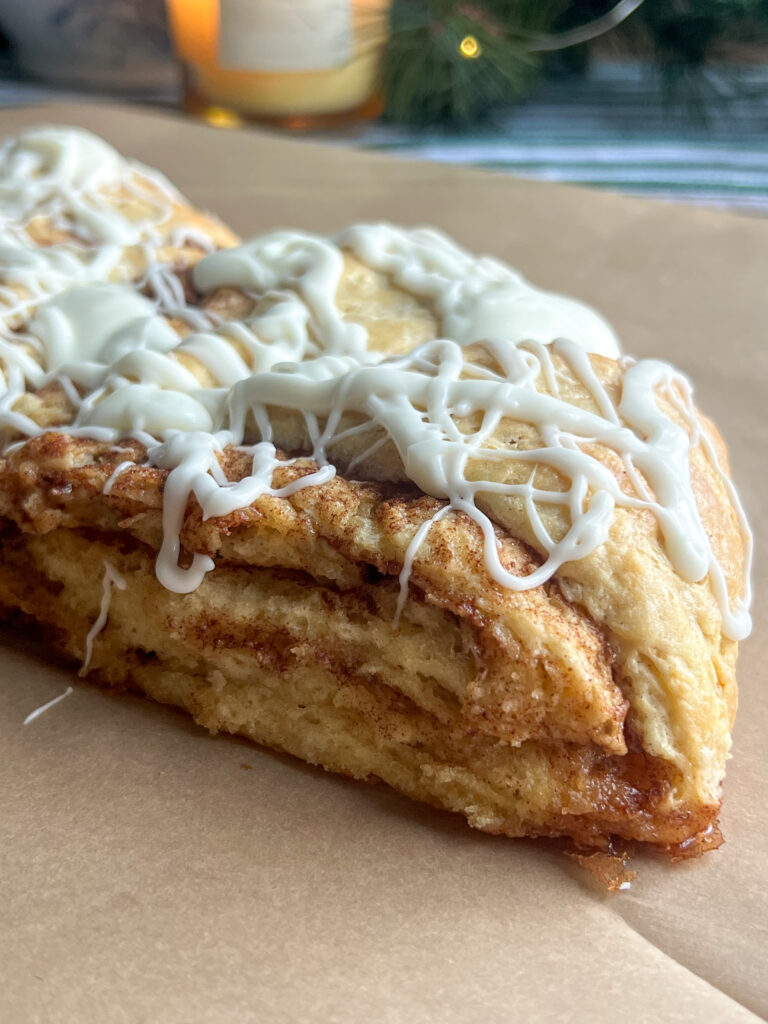Eggnog Cinnamon Roll Scones with glaze